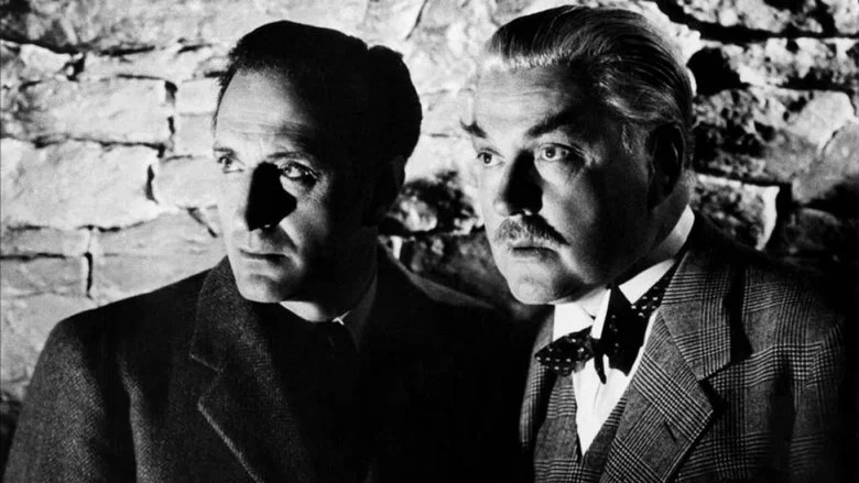 Black-and-white still of Sherlock Holmes and Dr Watson